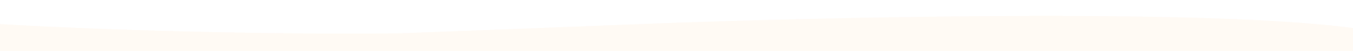 A green wavy shape sits on top of a beige background, creating a simple, curved color division.