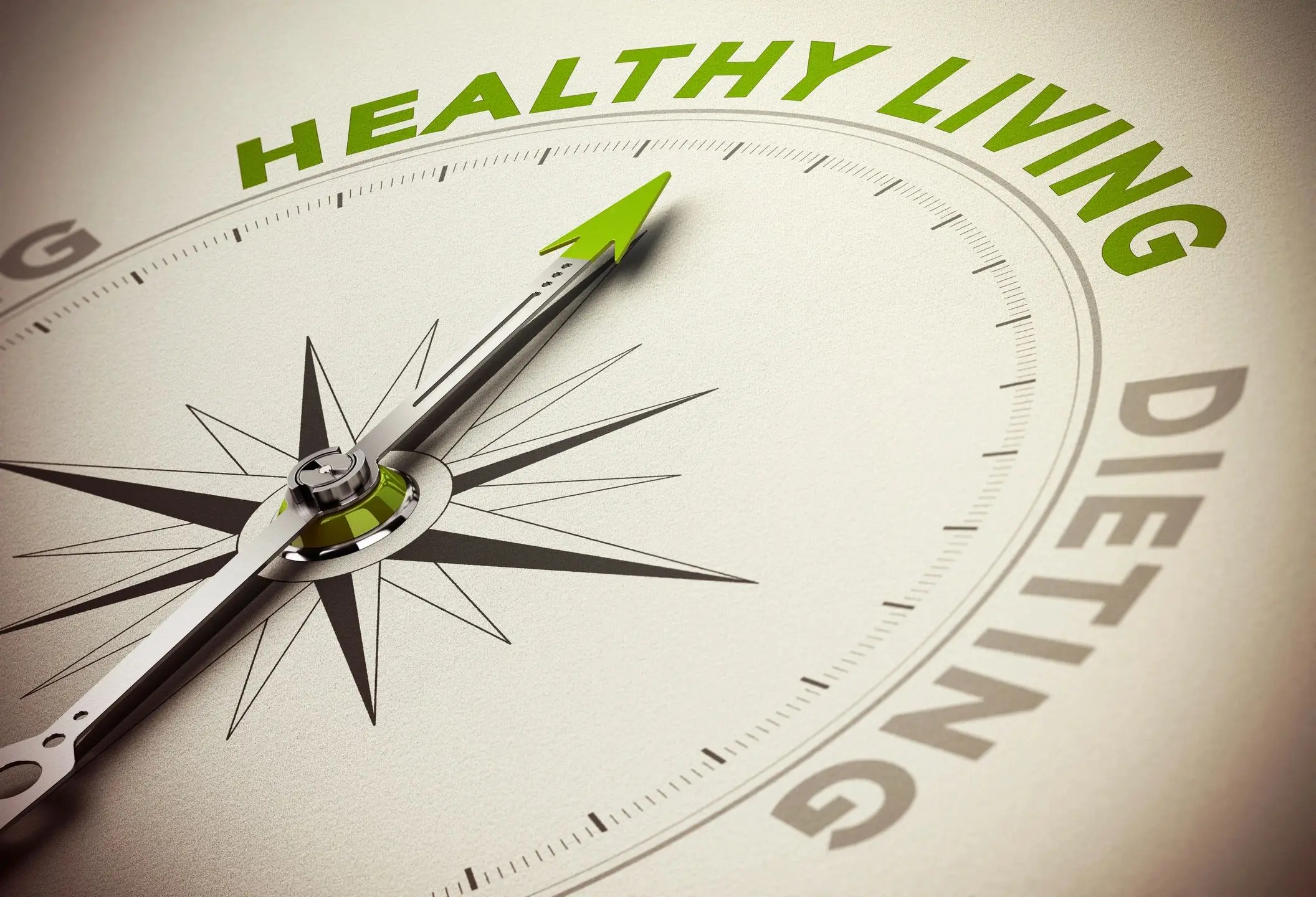 A compass with the words healthy living written on it.