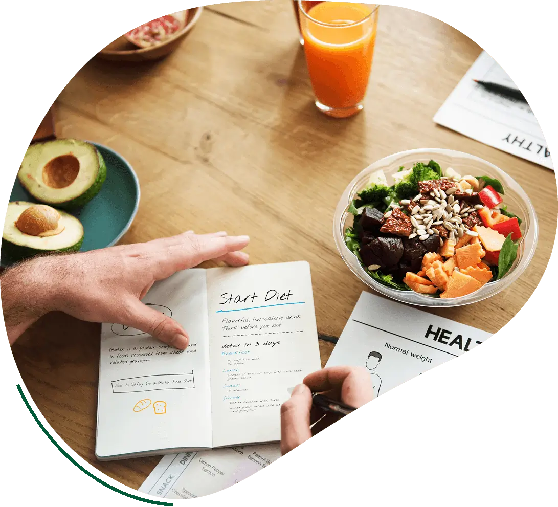 A person is reading a menu at the table